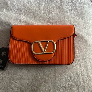 Orange Clutch with Gold Logo